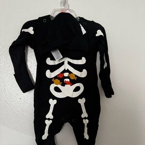 Baby outfit for newborn skeleton comes with hat.  Brand new tags still on.